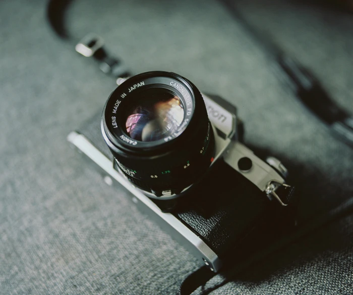 an old po sitting on a table, taken by a camera