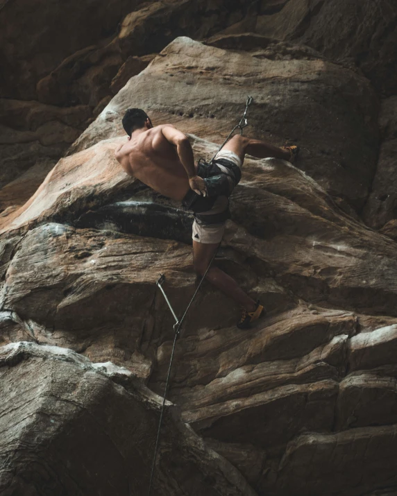 a person standing on the edge of a cliff