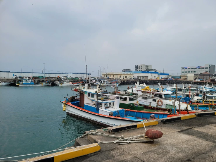 boats are docked on the water at the docks