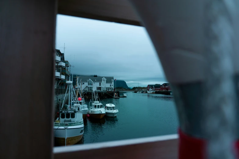 a view of boats in the water from the window