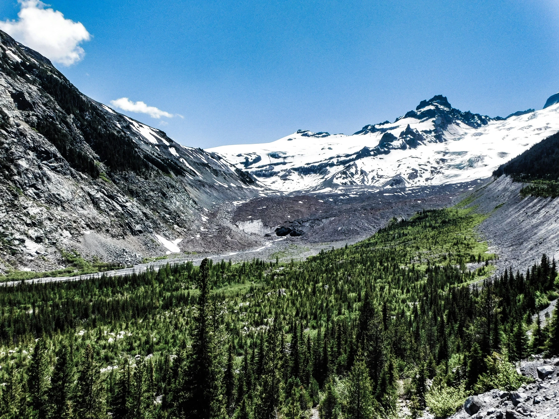 a mountain is seen with a sky background