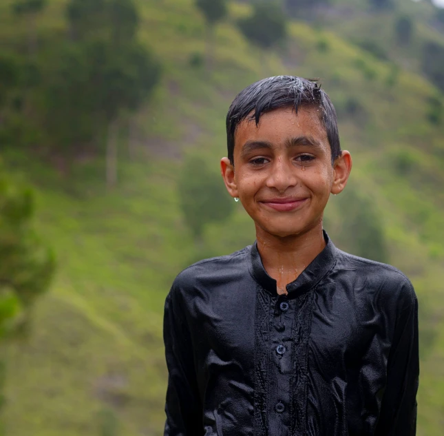 a smiling  with a black shirt