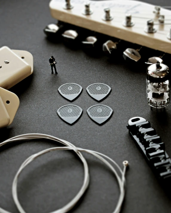 several small guitars sit next to each other