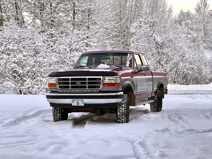 truck is stuck in the snow during winter