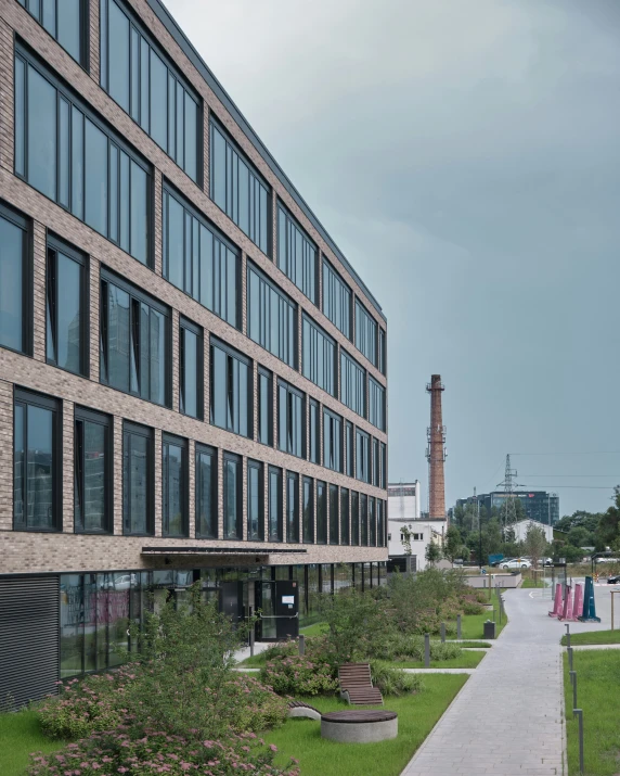 a very long building with lots of windows on it