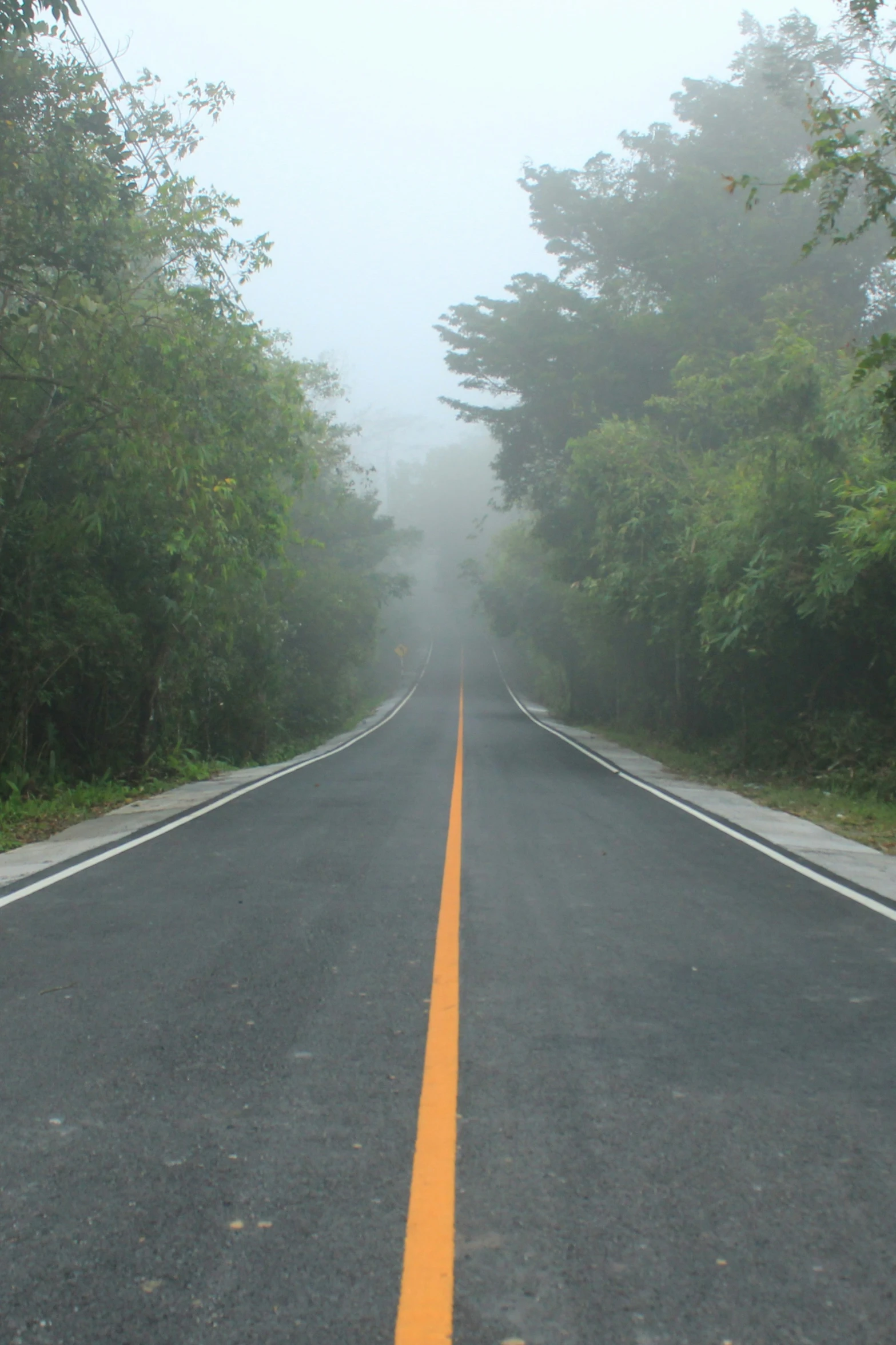 an empty road in the middle of nowhere