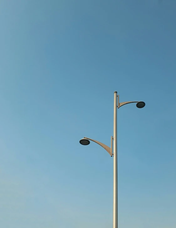 the two lights are attached to the street light