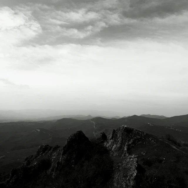 a black and white po of the top of a mountain