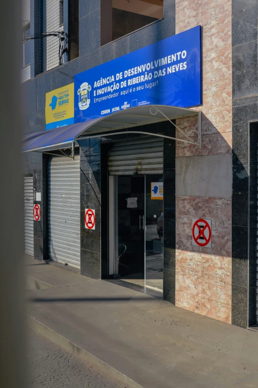 an empty store front with the door open