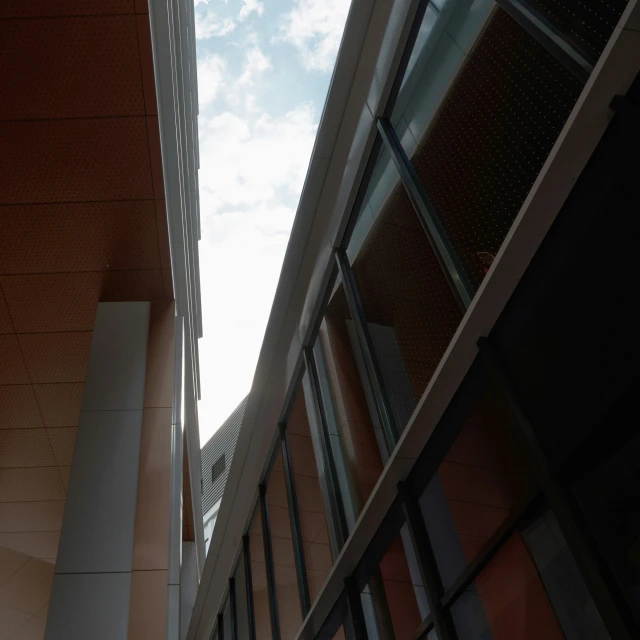 a large bird is perched on the outside of a building