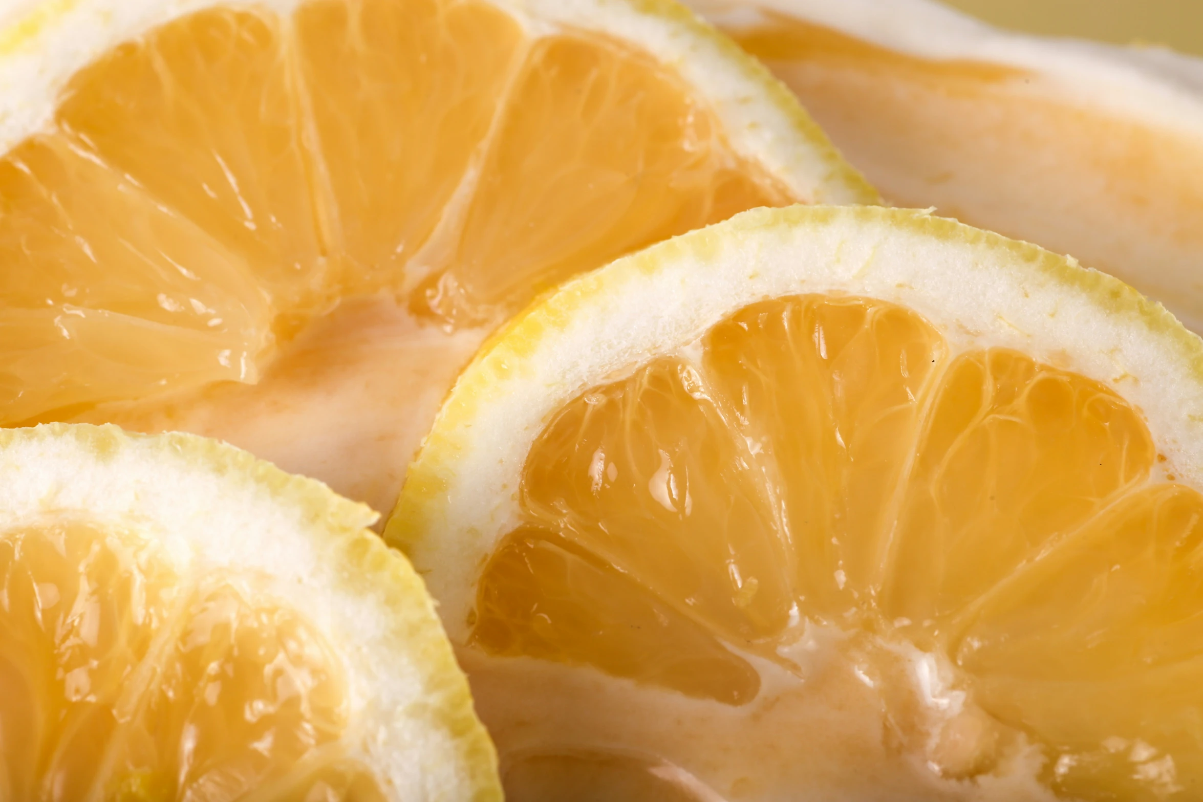 some very close up pictures of a lemon