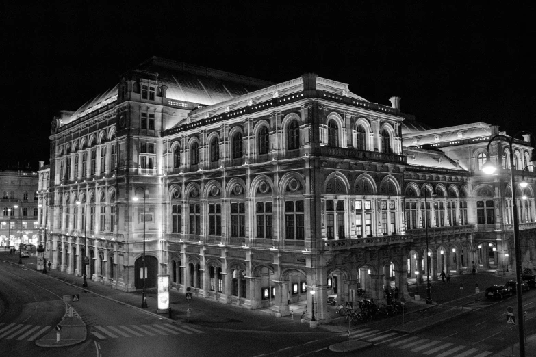 a building at night with lights around it