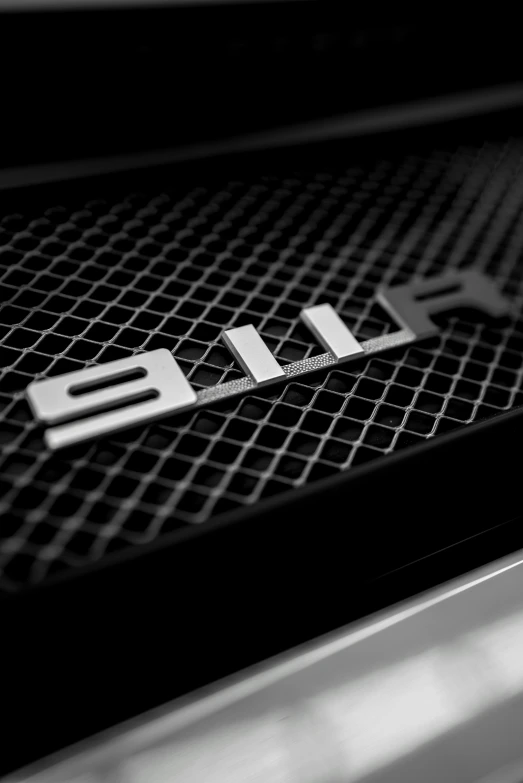 a close up view of the grill logo
