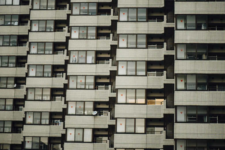 this is a building with many windows and bars