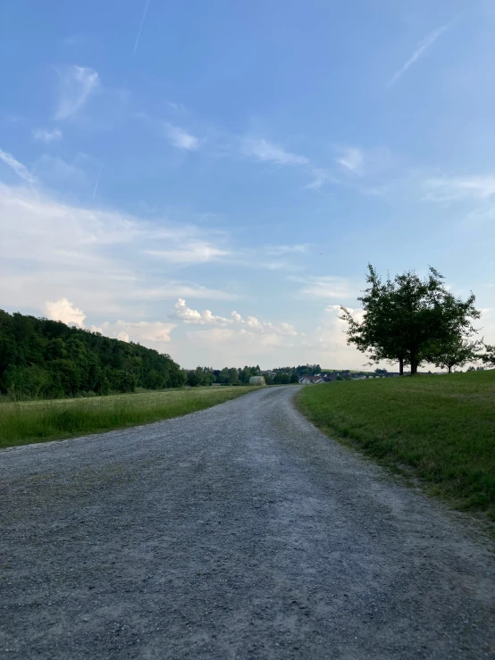 a lone road is pographed from the other side of the road