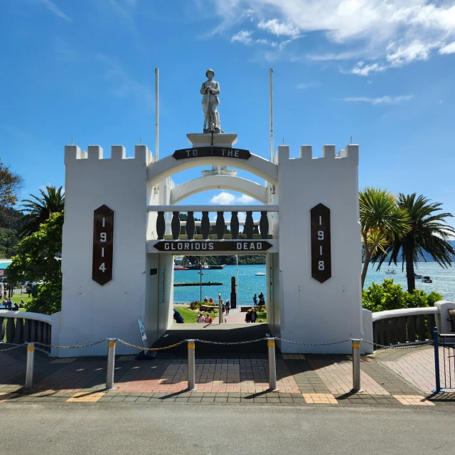 a building on a beach with a sky background