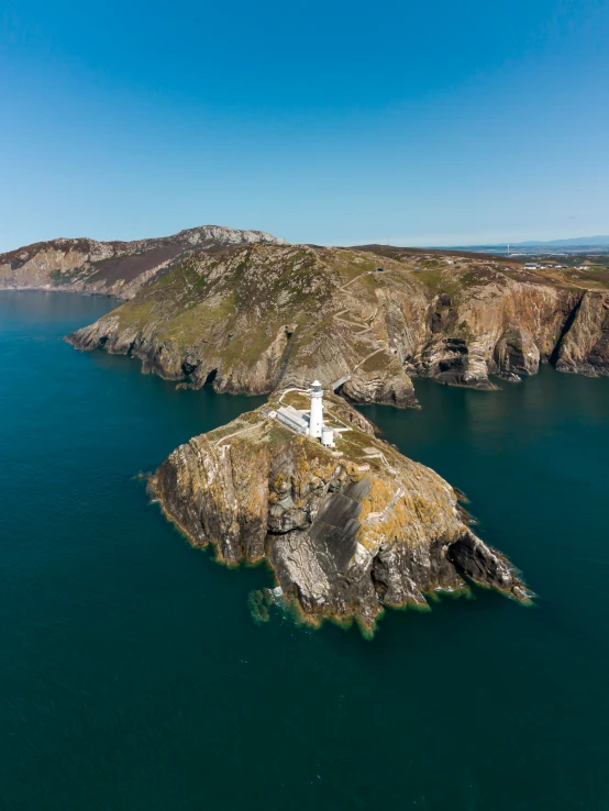 a large body of water surrounded by hills