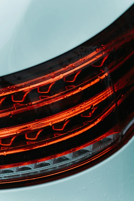 an image of a car rear view taken from the tail light