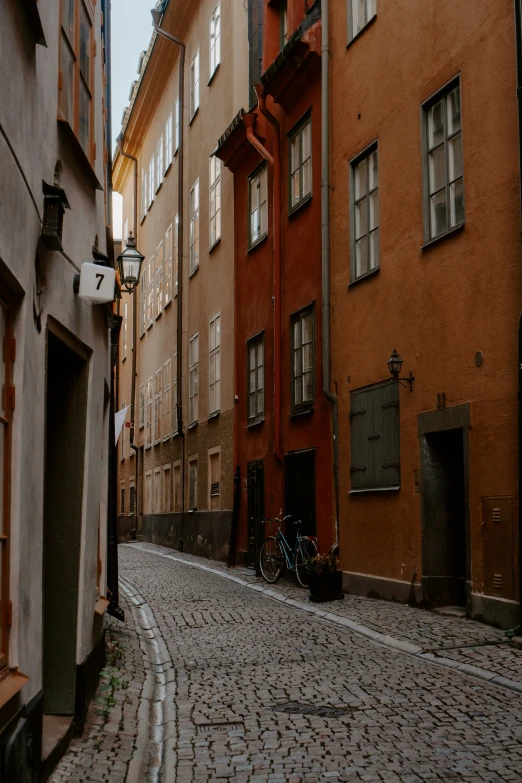 the cobblestone streets of the city are narrow