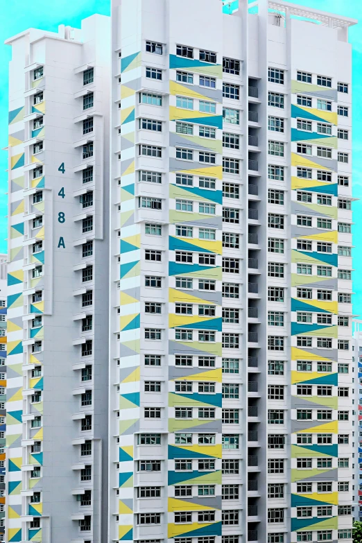 tall multistory apartment building with balconies painted on the side