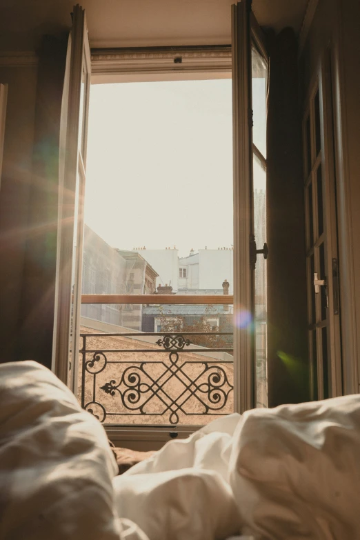 the light is shining through a window at some sort of building