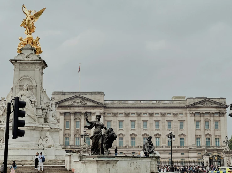 a very big pretty building with a fountain