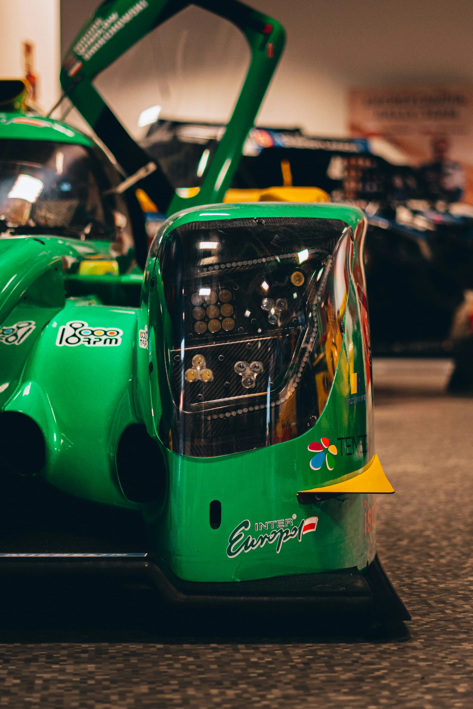 two green cars are shown side by side