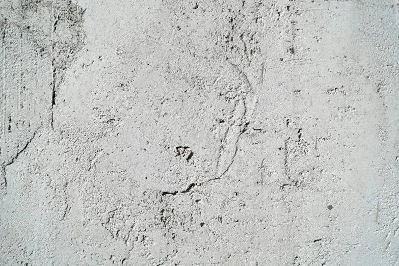 white concrete texture with black ink drawn onto it