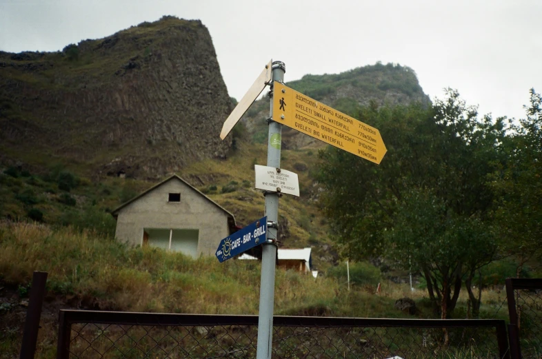 a street sign has many different signs on it