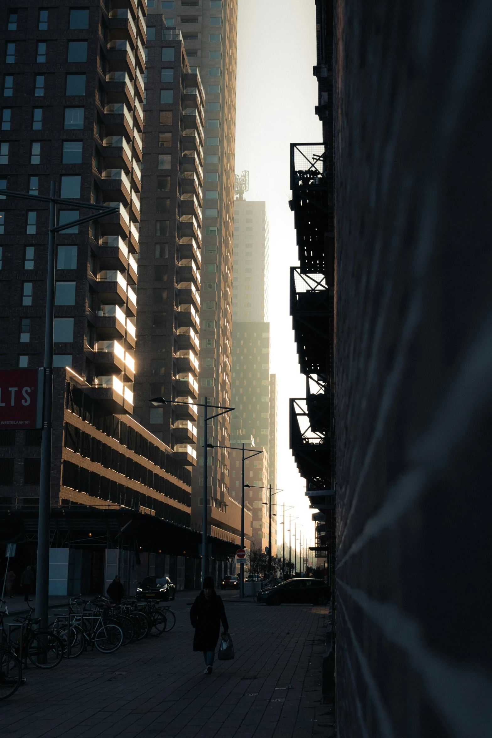 several people walking in the dark on a large city