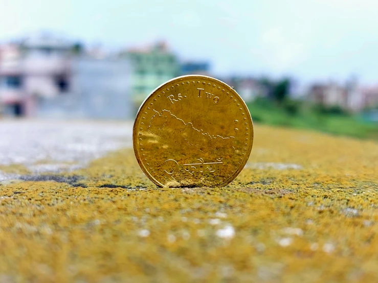 a coin that has been placed on the ground