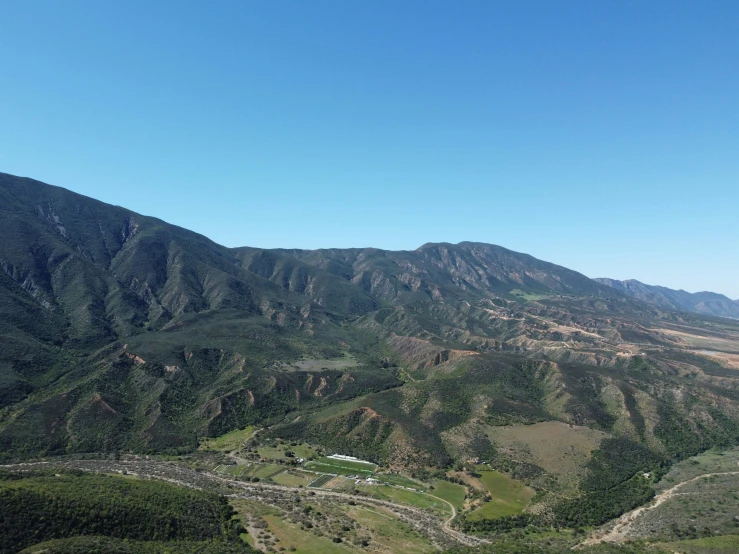 aerial s of mountain range in the blue sky