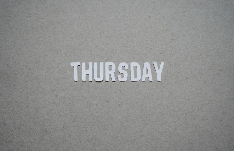 the words thursday written in small white letters