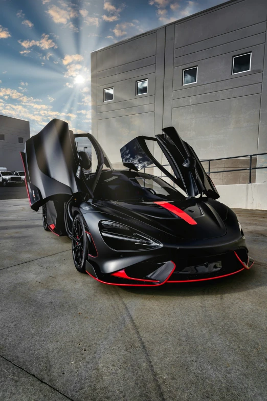 this is an image of a sleek black sports car