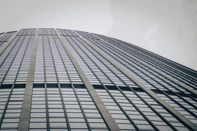 the side of a large building with an upward view