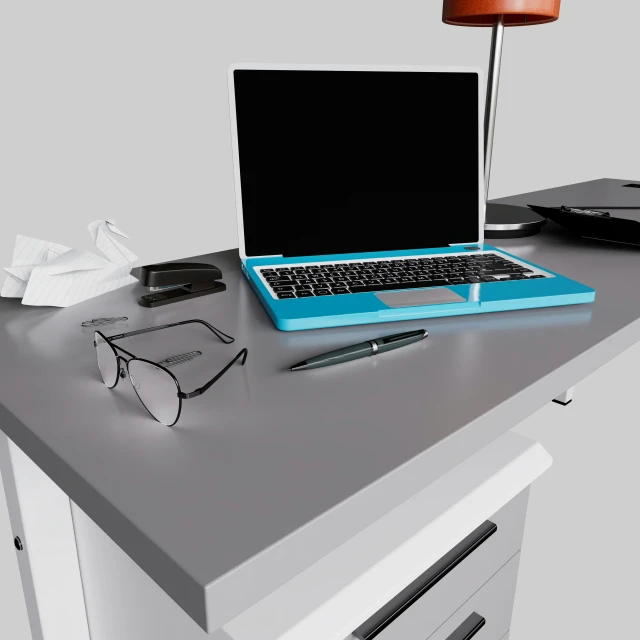 an open laptop computer sitting on top of a wooden desk