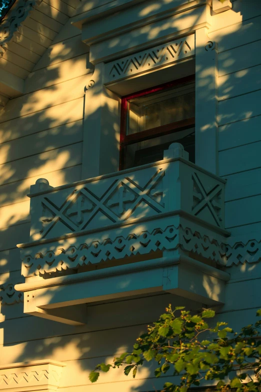 an old house has the sun shining brightly through a window