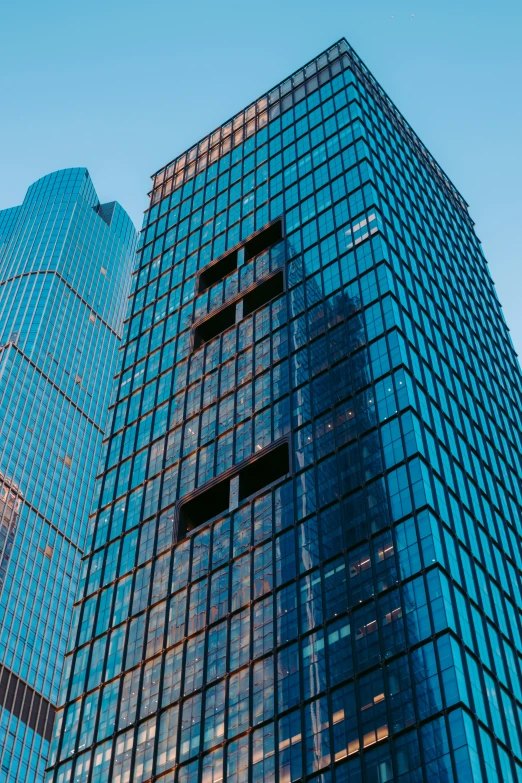 an office building with lots of glass windows