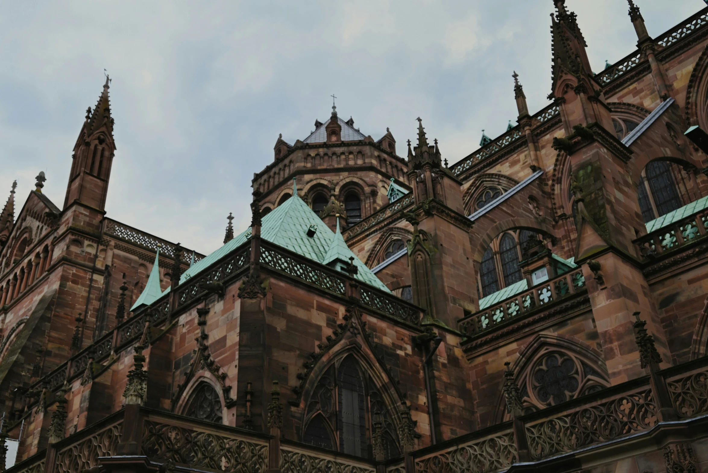 an ornate old building with an ornate roof