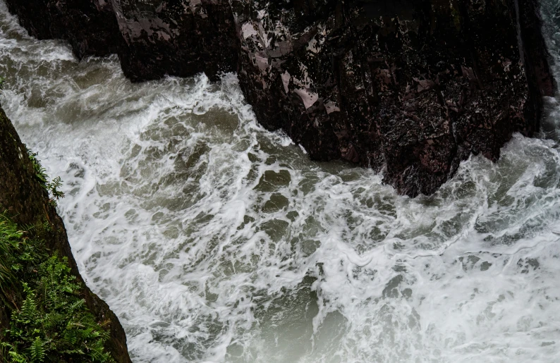 this water looks to be raging out of the rocks