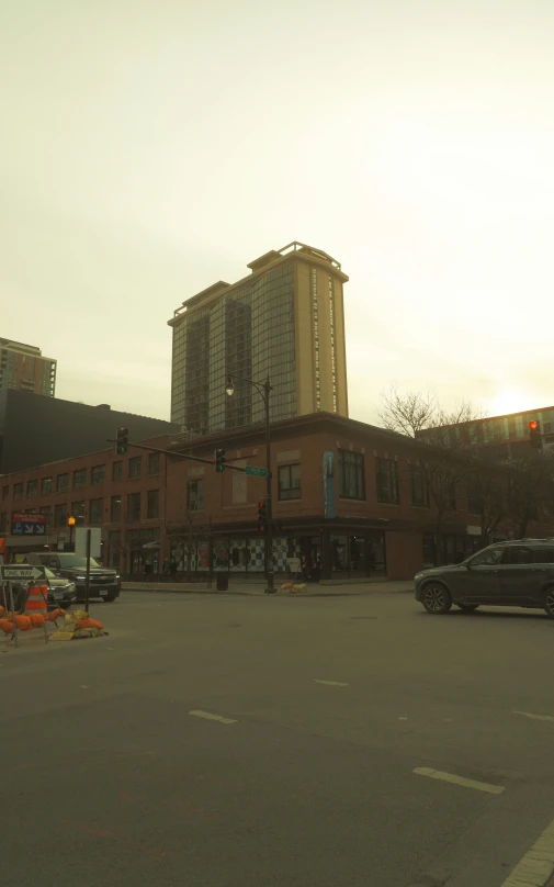 a city street corner with traffic at an intersection