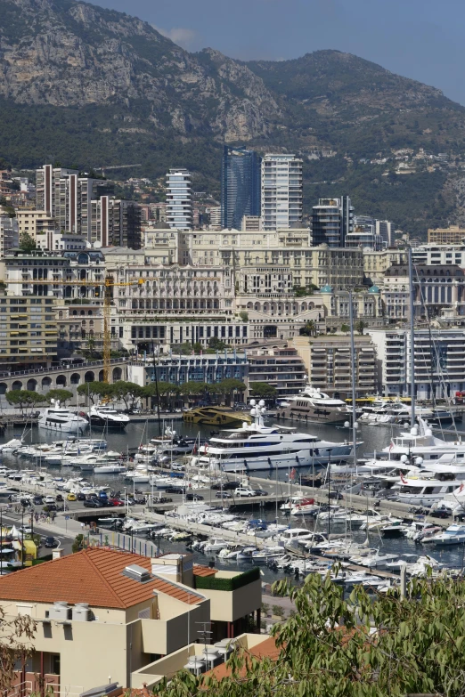 a city with yachts and buildings that include yachts