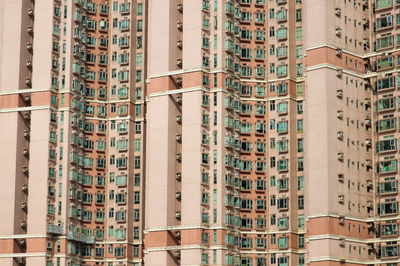 a close up of a very tall building with many windows