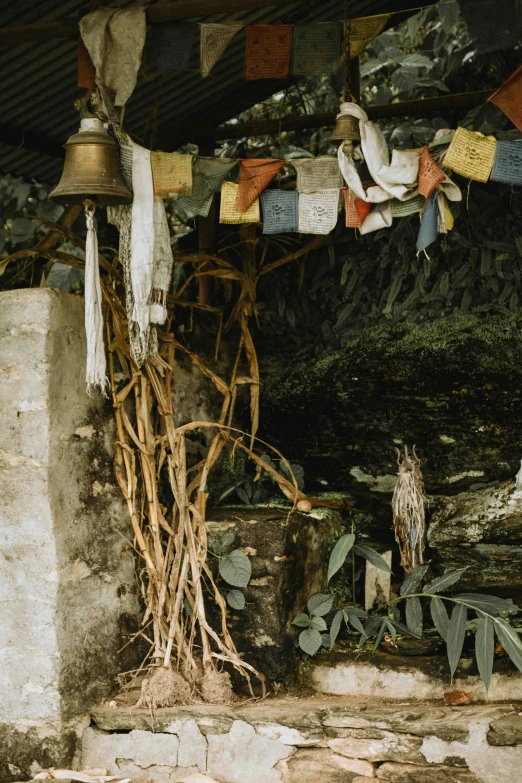 a close up of an old water wheel near a wall