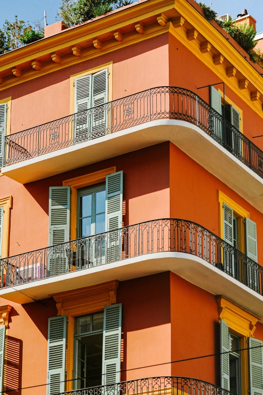 this is an apartment building with many balconies