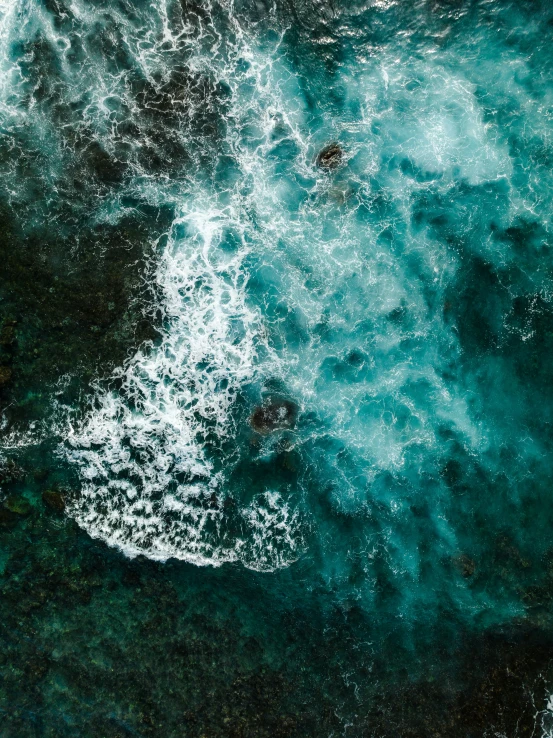 top down view of an ocean wave breaking