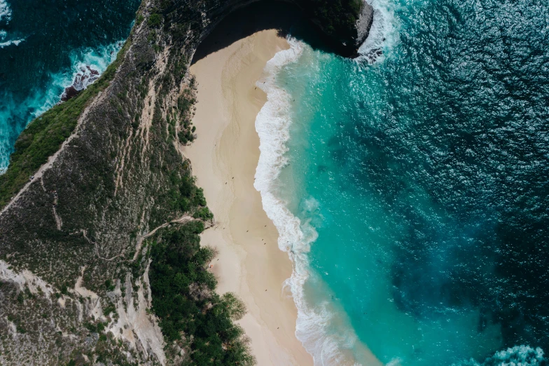 an ocean view from the top of a helicopter