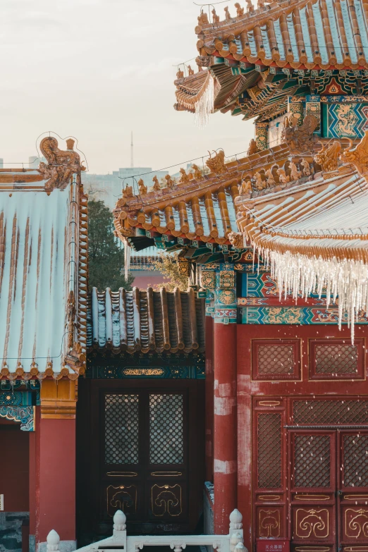 an elaborate red and gold building in china