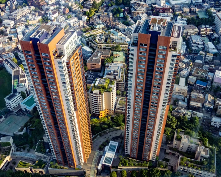 a high rise building in a city from above