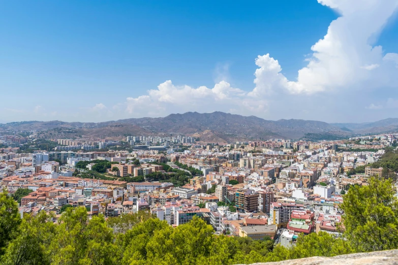 a big city from atop the hill